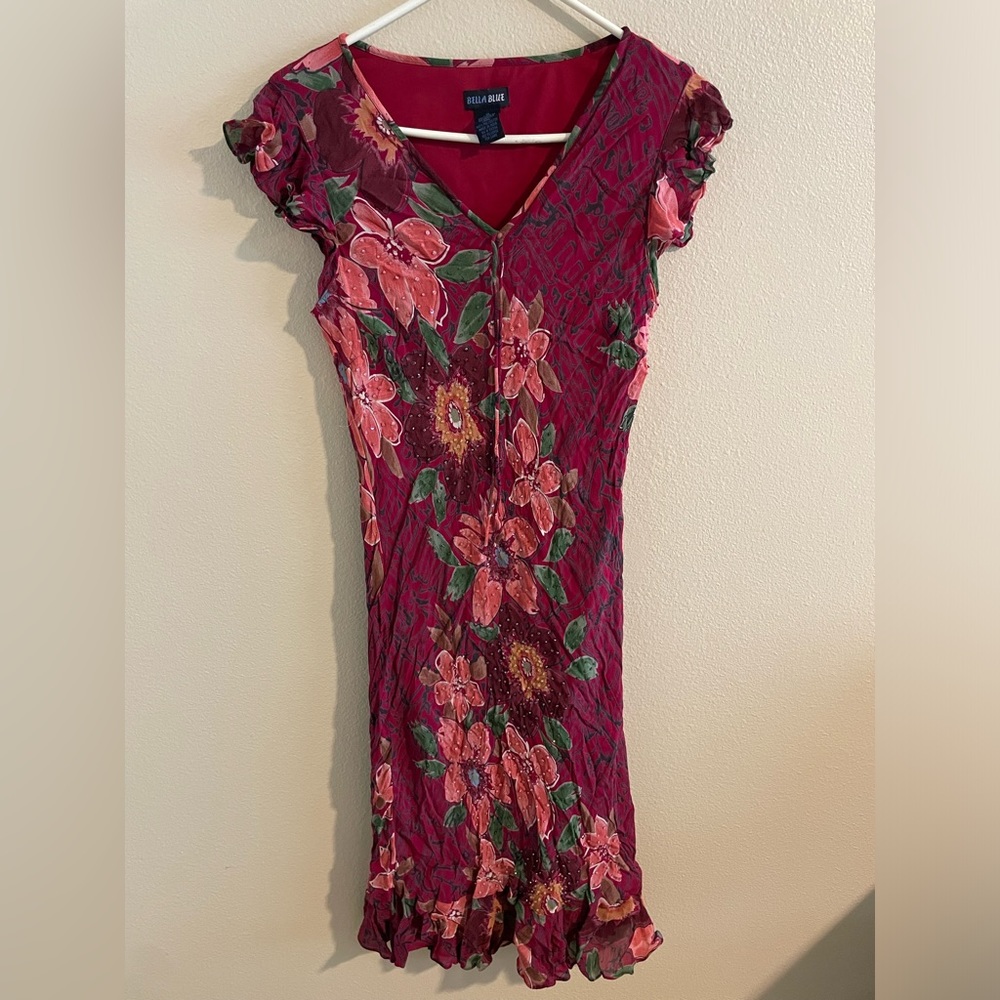 BEAUTIFUL flower dress with small beads, ruffled bottom & sleeves.